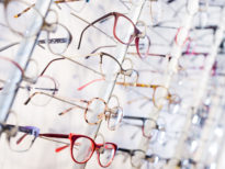 Image of a spectacles on shelf in the optical store, nobody